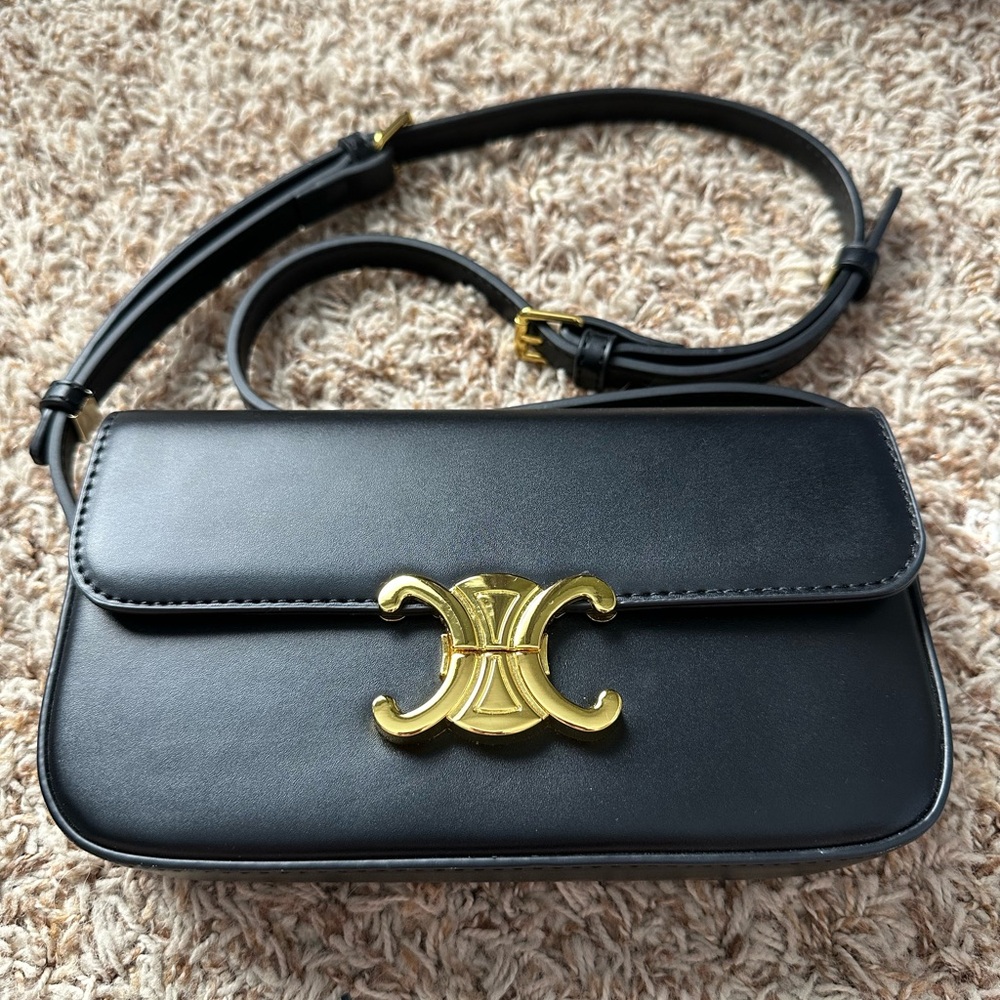 Black and Gold Crossbody Bag with Elegant Hardware